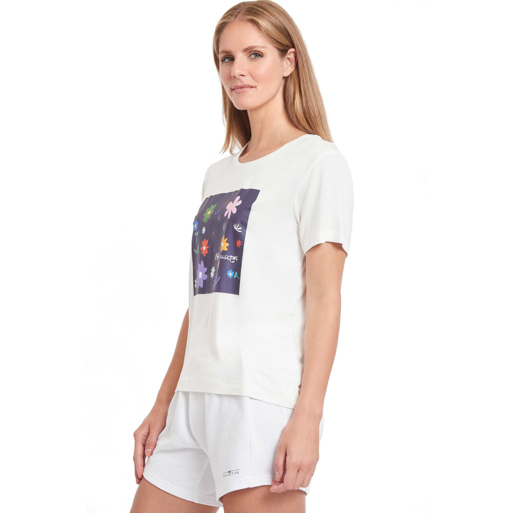 Woman wearing PSK Collective Floral Graphic Tee in white color side view