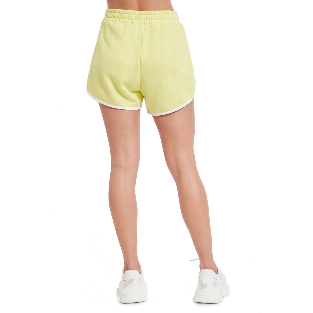 PSK Collective Curved Hem Shorts canary yellow color back view