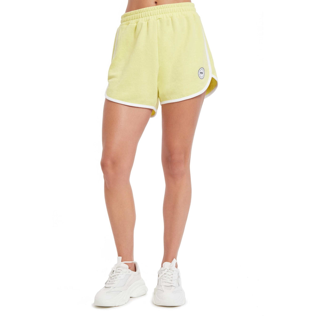 PSK Collective Curved Hem Shorts canary yellow color front view