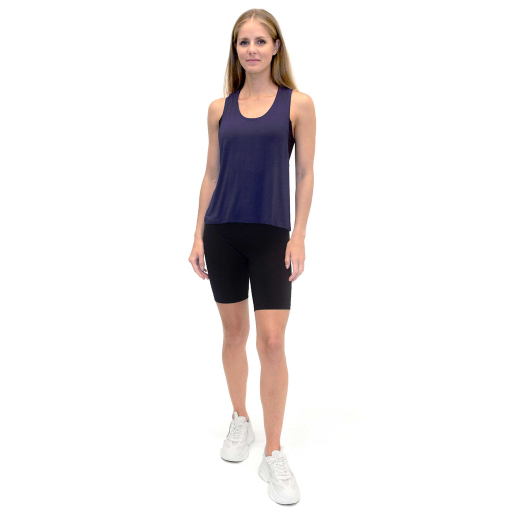 Woman wearing PSK Collective Racerback Tank Top in cobalt color full body view