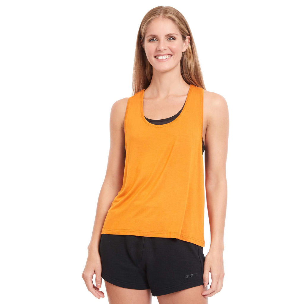 Woman wearing PSK Collective Racerback Tank Top in tiger color front view