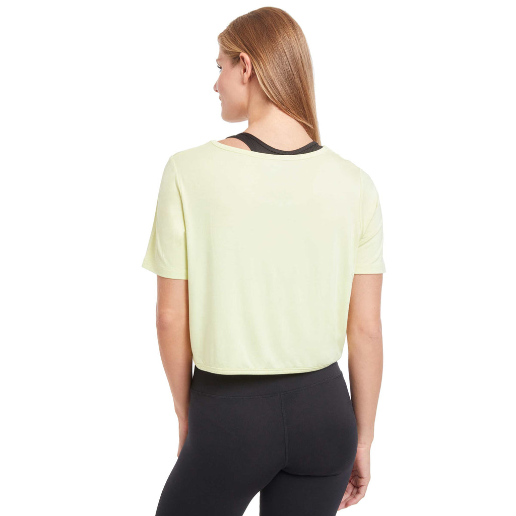 Woman wearing PSK Collective Tie Front Top in pale lime color back view