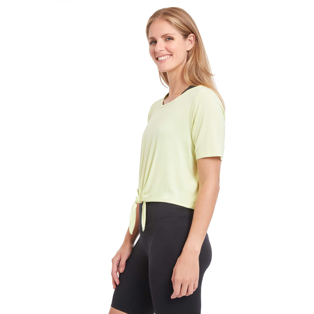 Woman wearing PSK Collective Tie Front Top in pale lime color side view